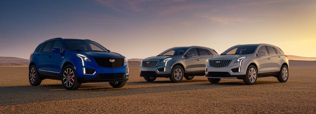 front view of three 2025 Cadillac XT5
