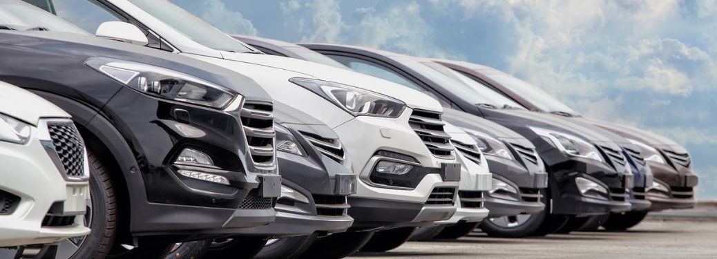 hood view of parallel parked used cars