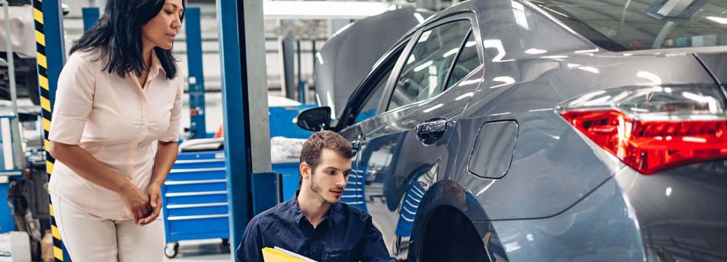 a woman at a car service center