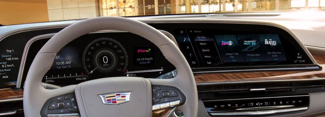 dashboard view of a Cadillac with SiriusXM on display