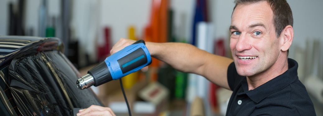 A mechanic working on a vehicle