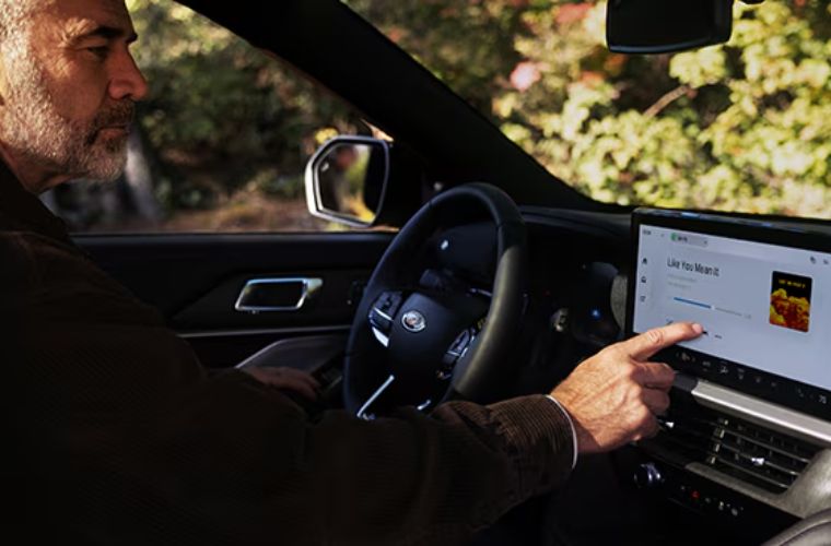 A man using a touchscreen display