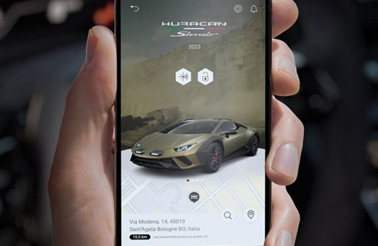 a hand accessing the UNICA app in a phone