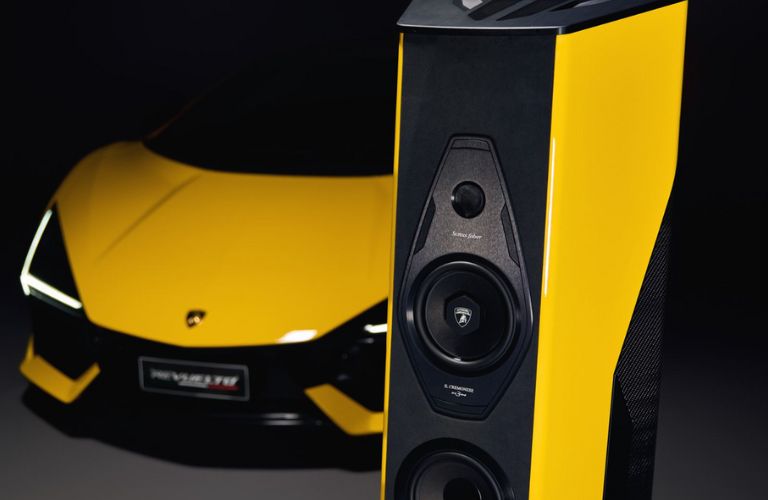 Sonus Faber speaker and a Lamborghini in the background