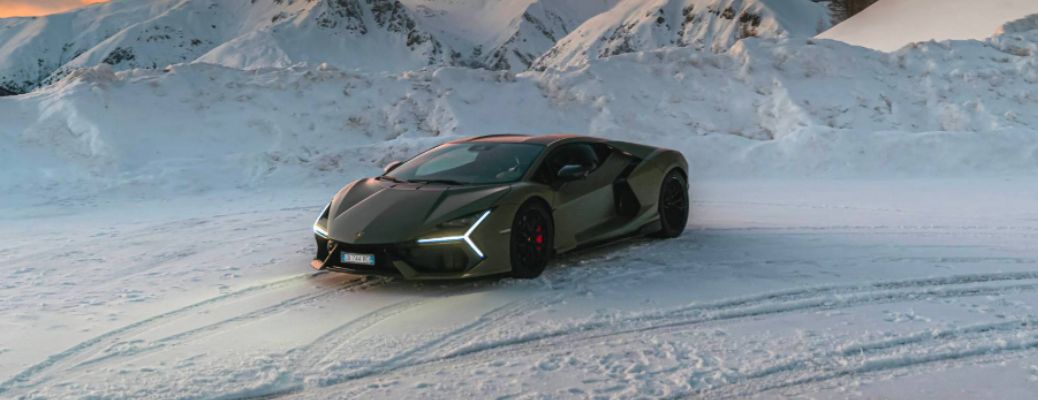 front and side view of the 2025 Lamborghini Revuelto in snow