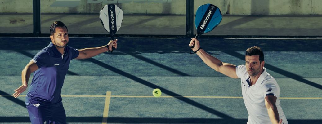 two men playing tennis
