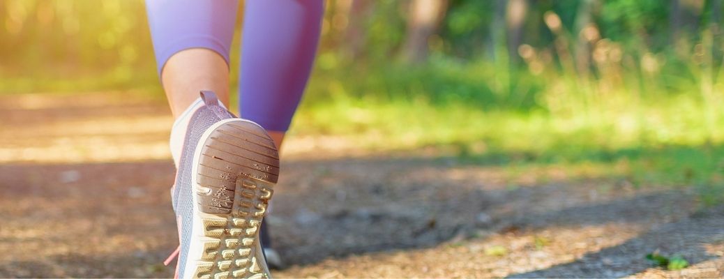 close up of a woman's shoes while she's running