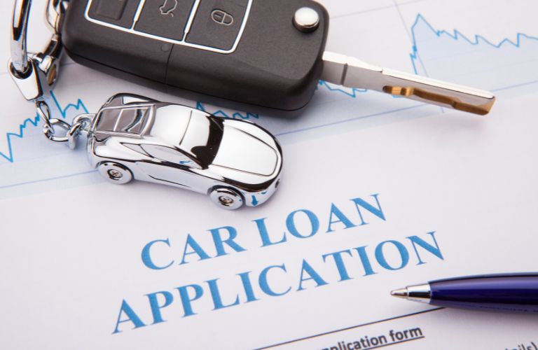 Vehicle financing application form with car keys