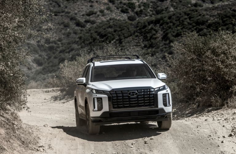 A 2023 Hyundai Palisade XRT model on a gritty terrain