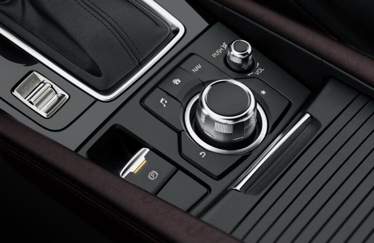 sliding covered center console on the 2017 mazda3