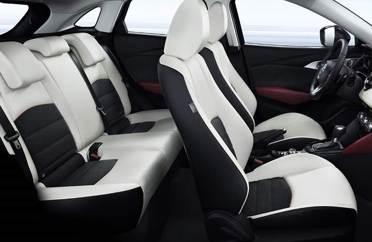 Steering Wheel and White and Black Seats of 2018 Mazda CX-3