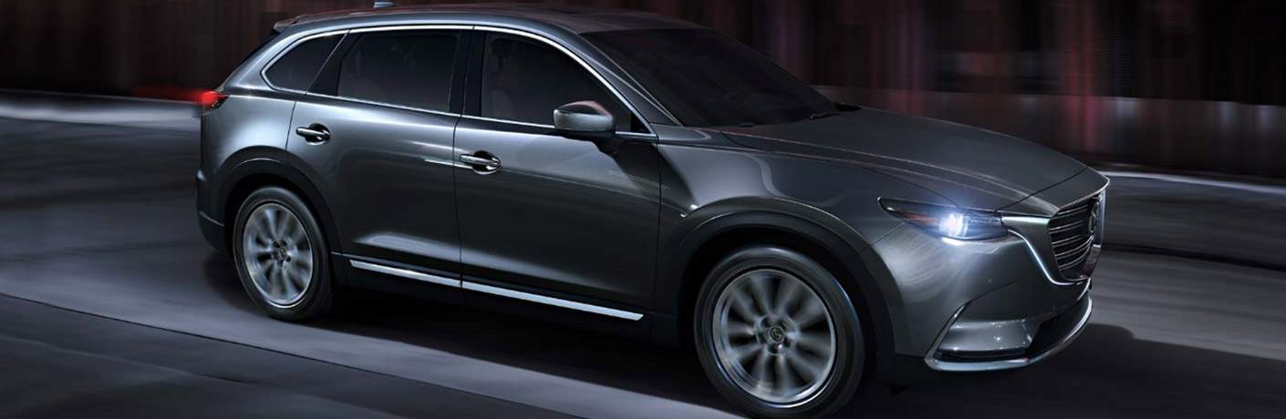 Grey 2018 Mazda CX-9 Driving at Night on City Street