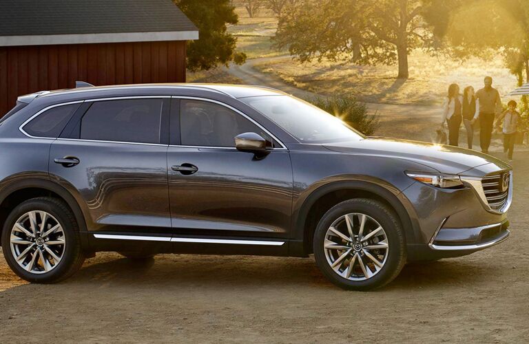 Grey 2019 Mazda CX-9 parked near a barn