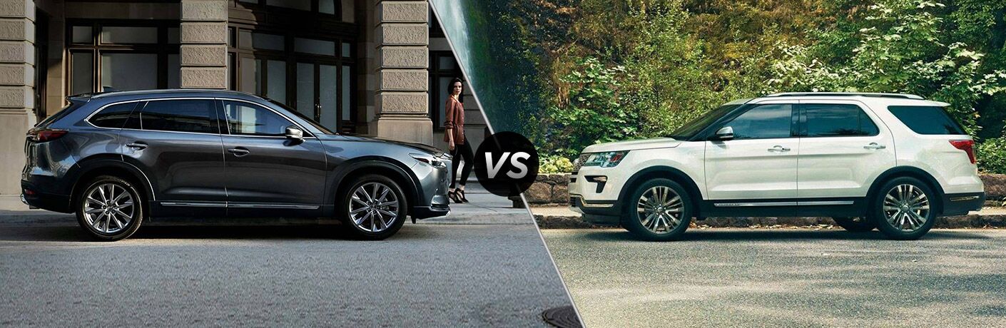 Grey 2019 Mazda CX-9, VS icon, and white 2019 Ford Explorer