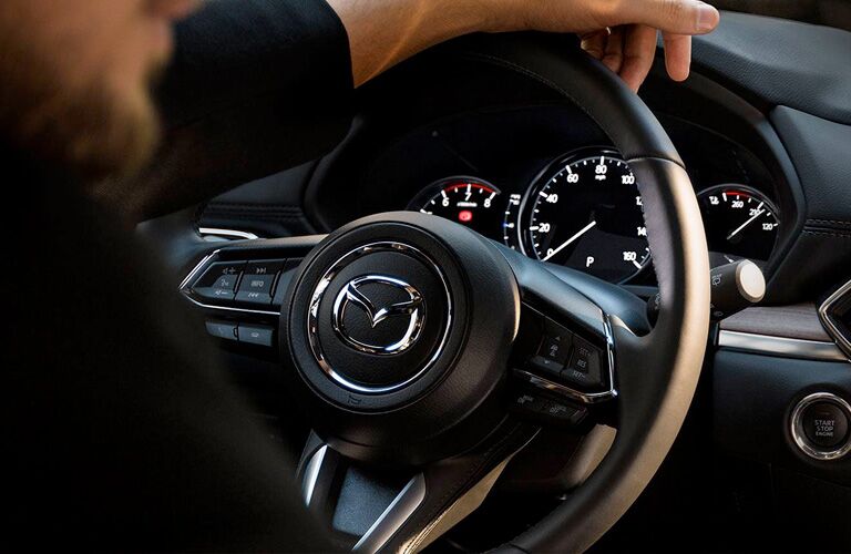 Steering wheel and gauges in 2019 Mazda CX-5