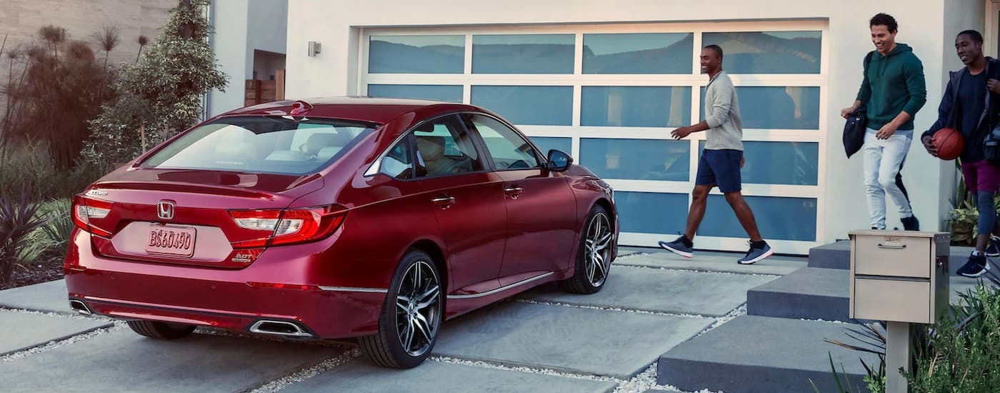 Red 2021 Honda Accord parked in a driveway