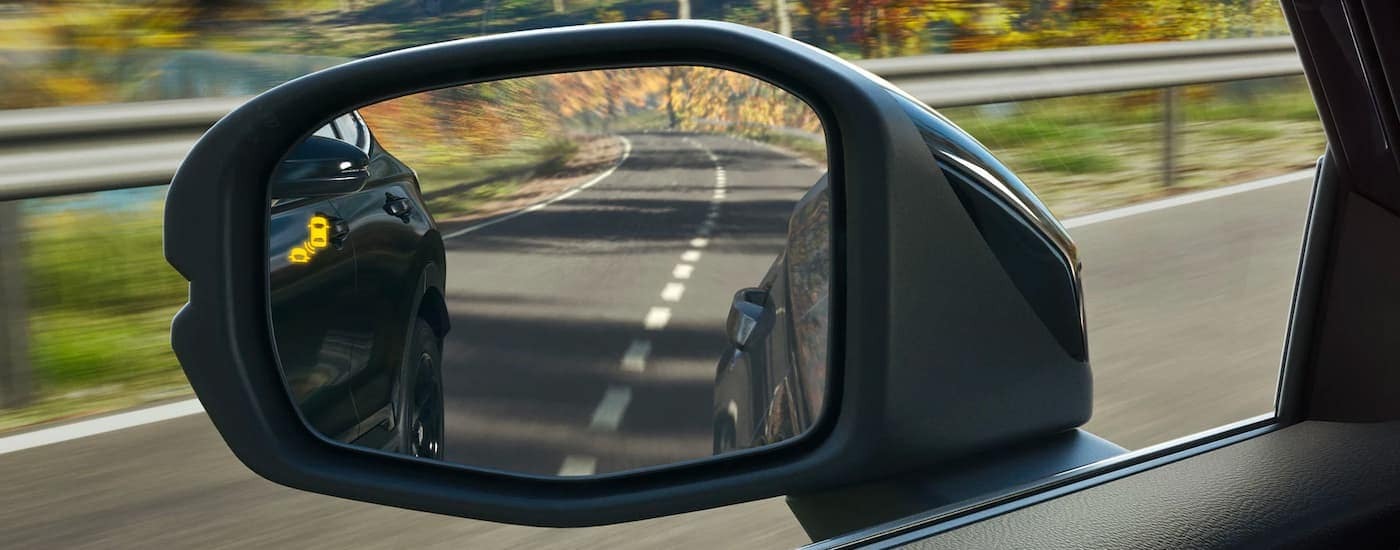 Side mirror on a 2023 Honda CR-V SUV for sale near you.