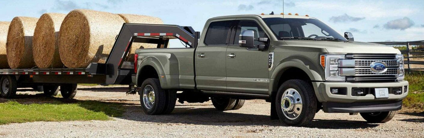 2019 Ford Super Duty F-350 Platinum towing hay bales