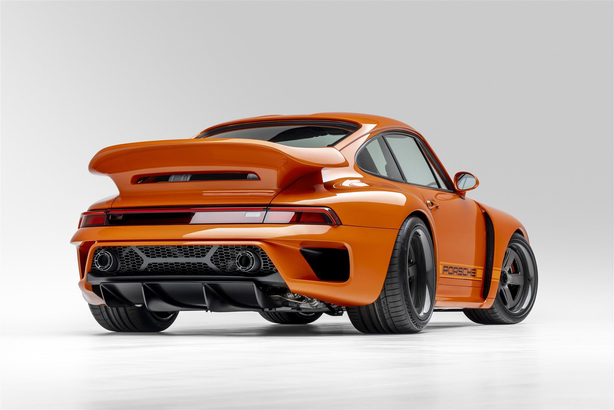 Porsche Turbo model rear and side angle on white