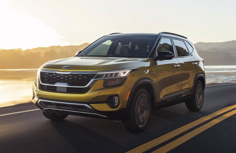 2021 Kia Seltos driving on road front view