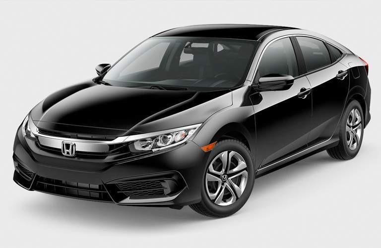 front view of a black 2018 Honda Civic LX Sedan on a gray background
