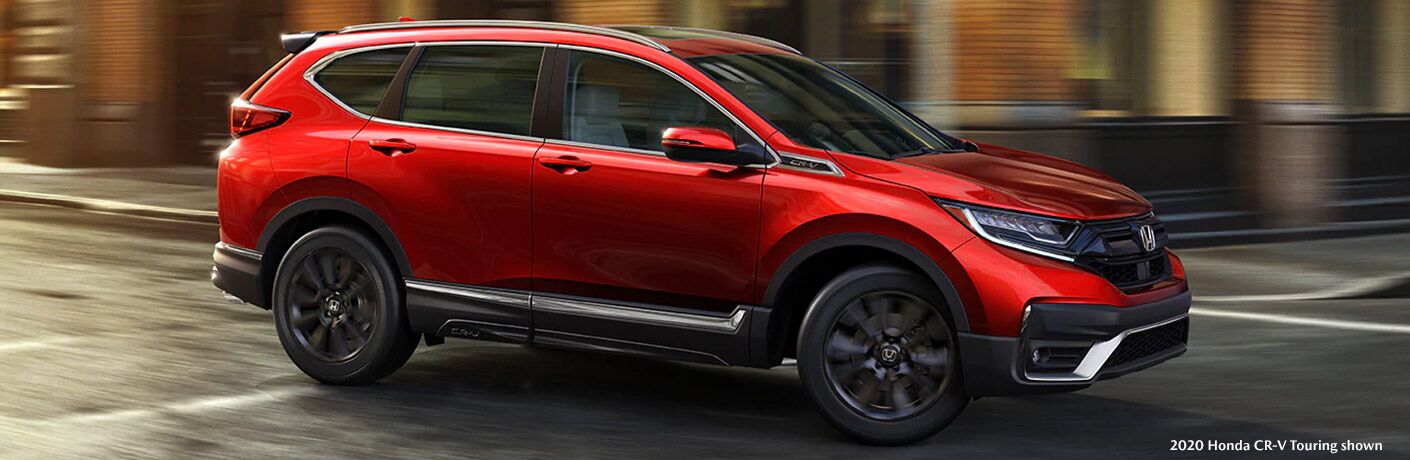 Red 2020 Honda CR-V Touring driving