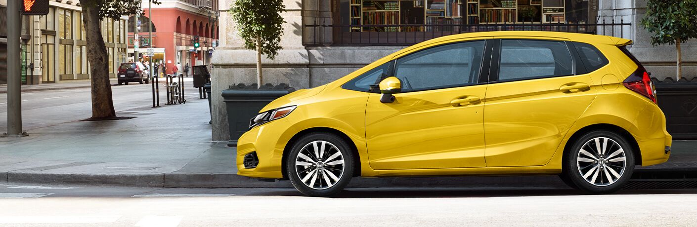 Yellow 2020 Honda Fit parked on street