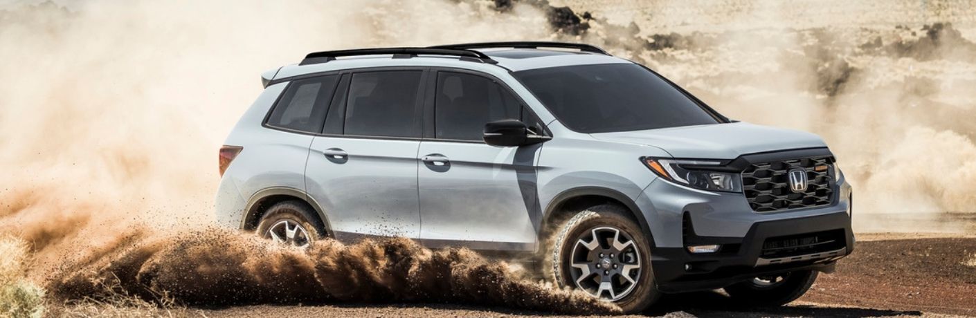 A 2022 Honda Passport on a dirt road