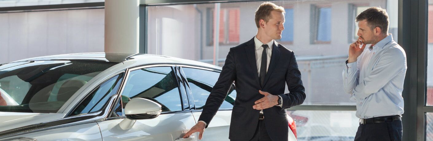 People talking about a car