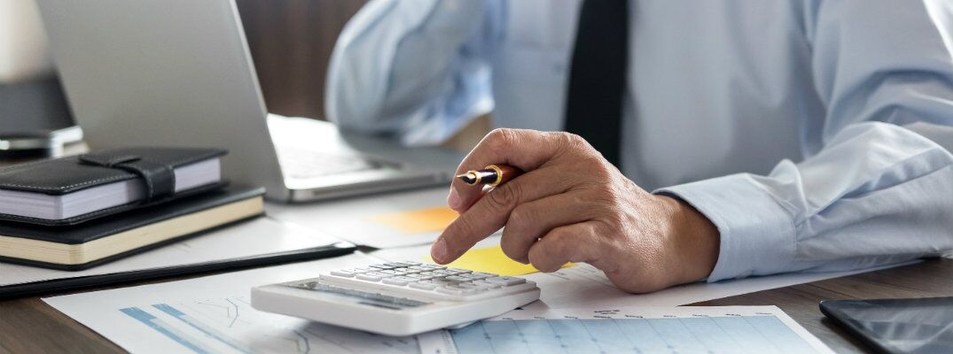 Man looking over papers