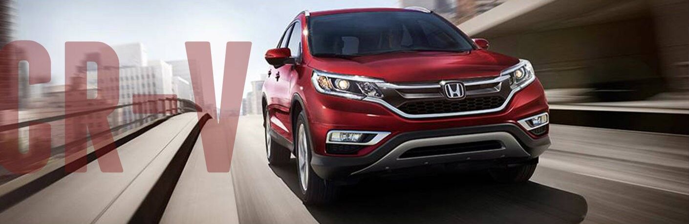 2016 Honda CR-V red front fascia driving cr-v in writing on left side
