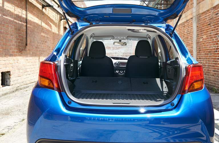 2017 Toyota Yaris with the rear hatchback door open to display its cargo space