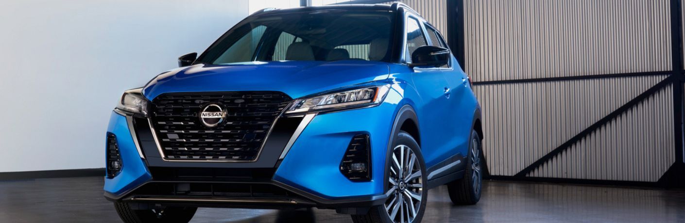 Front view of the 2021 Nissan Kicks parked in a garage