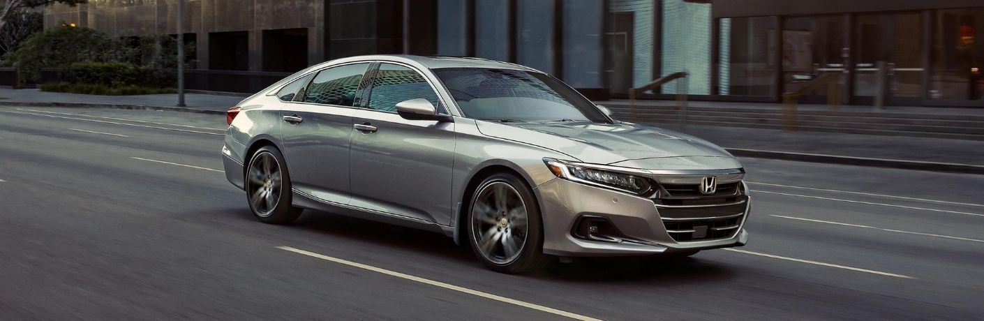 Used 2022 Honda Accord Gray driving on a city road