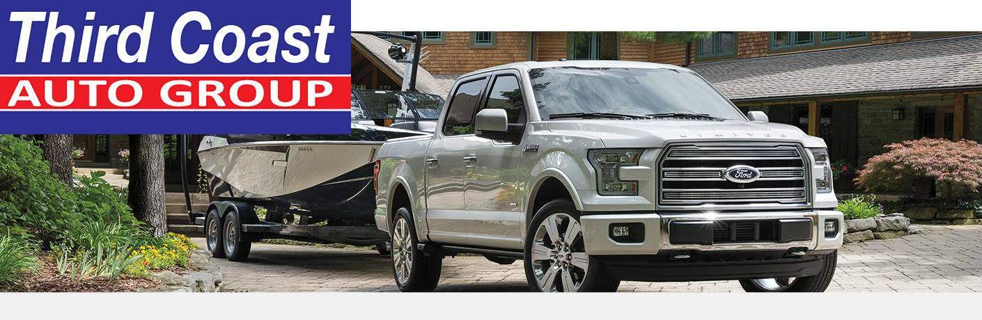 2017 Ford F-150 Limited, seen from the side and with a Third Coast Auto Group logo in the upper left hand corner