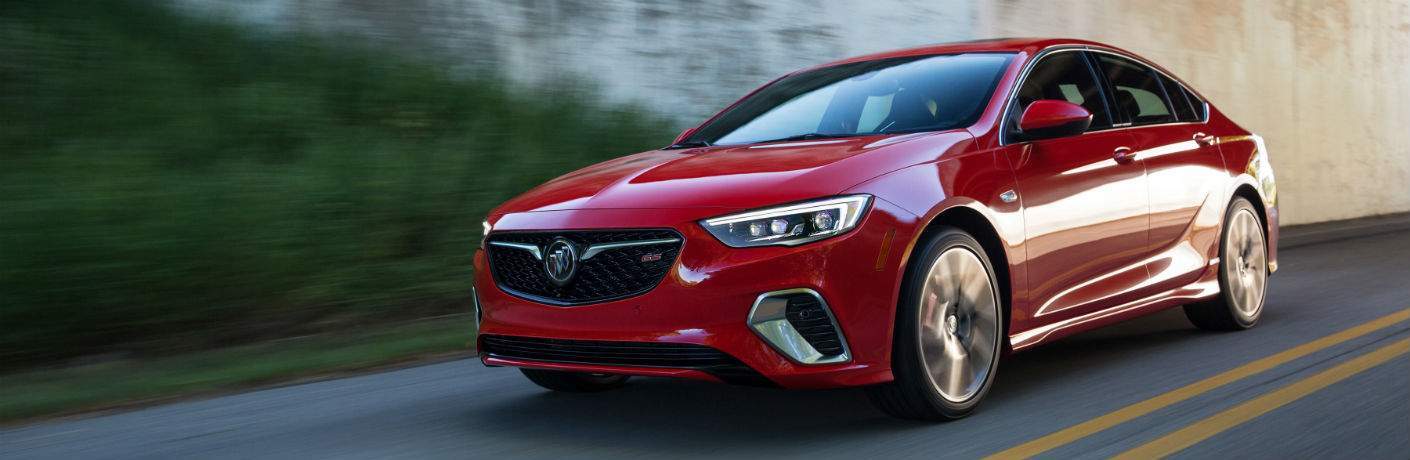 2018 Buick Regal in red driving down the road