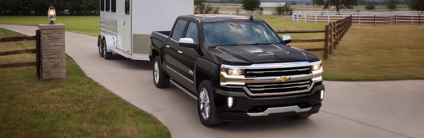 Chevy Silverado 1500 towing a horse stall