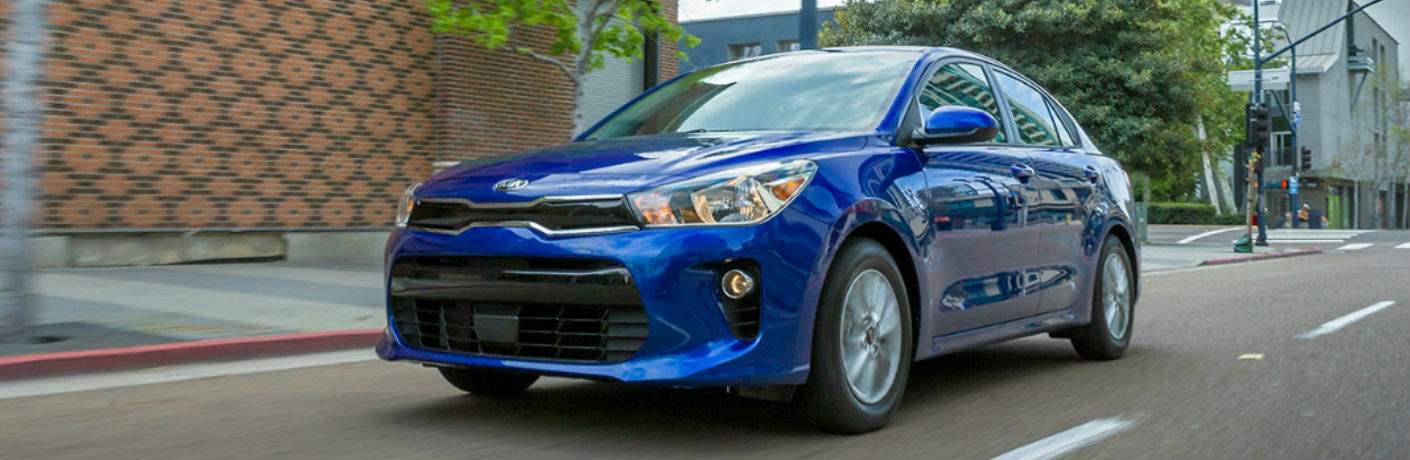 2018 Kia Rio exterior and front grille in a bold blue