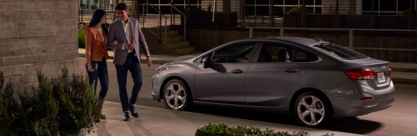 2019 Chevy Cruze parked on a curb at night