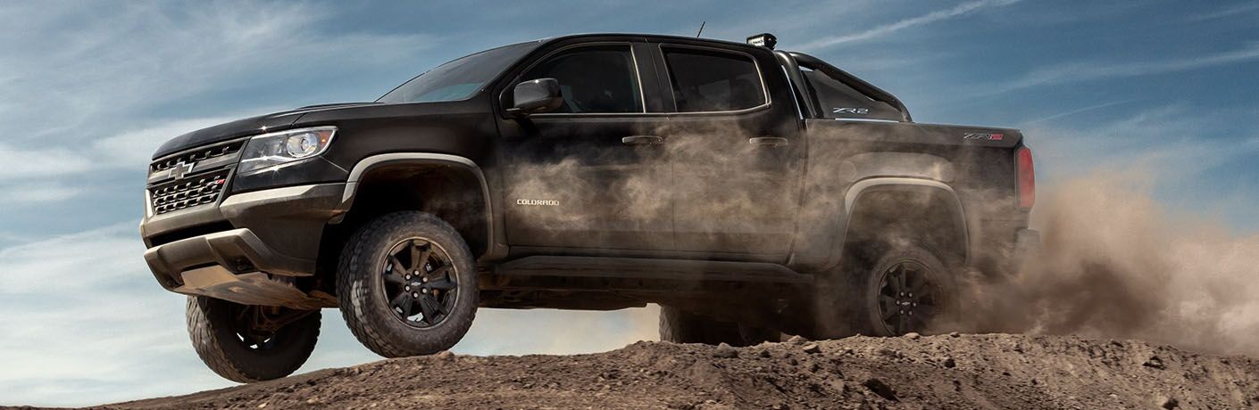 2019 Chevy Colorado driving over sandy hill