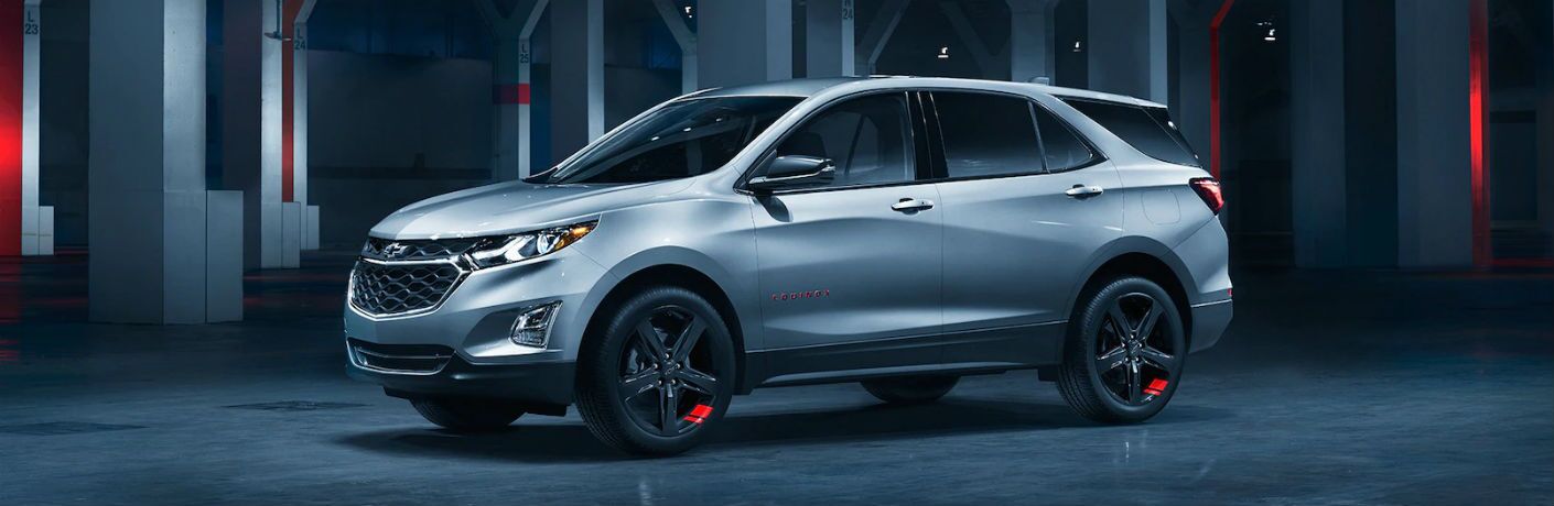 2019 Chevy Equinox exterior in grey with red accents on each wheel
