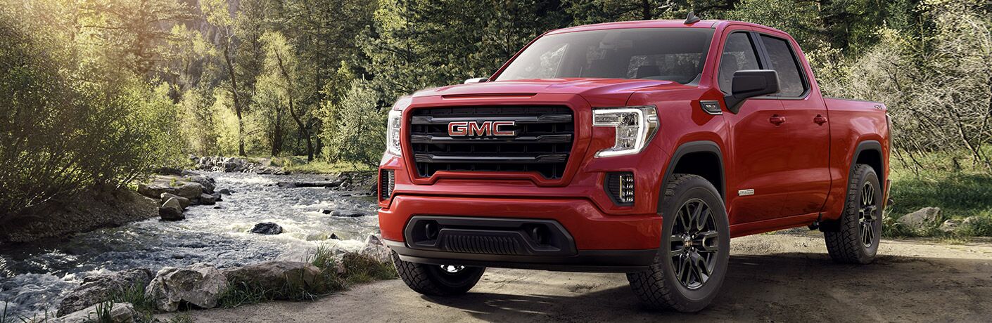 2020 GMC Sierra parked next to a river
