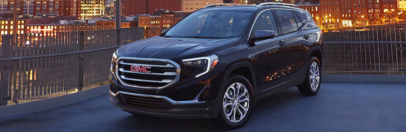 2020 GMC Terrain parked on a rooftop at dusk