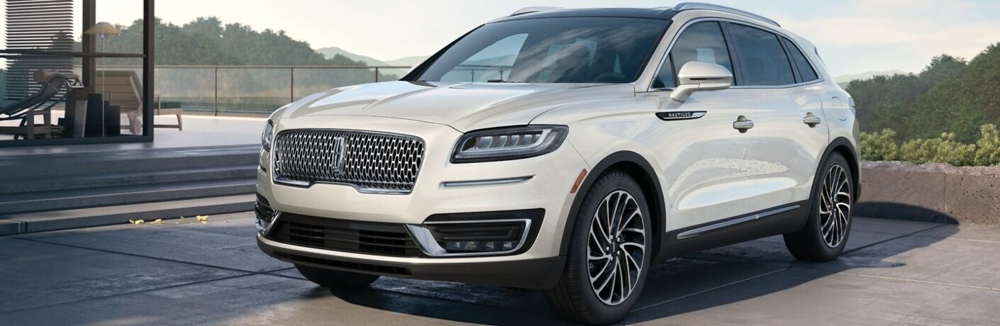 2020 Lincoln Nautilus parked next to glass building