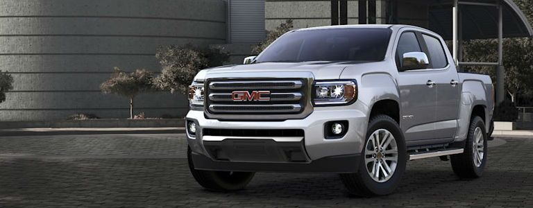 GMC Canyon parked near a building