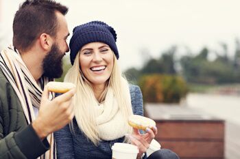 couple enjoying coffee and pastries on valentines date