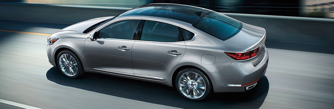 left side view of silver kia cadenza