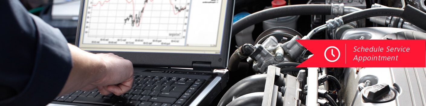 man working on laptop, schedule service link