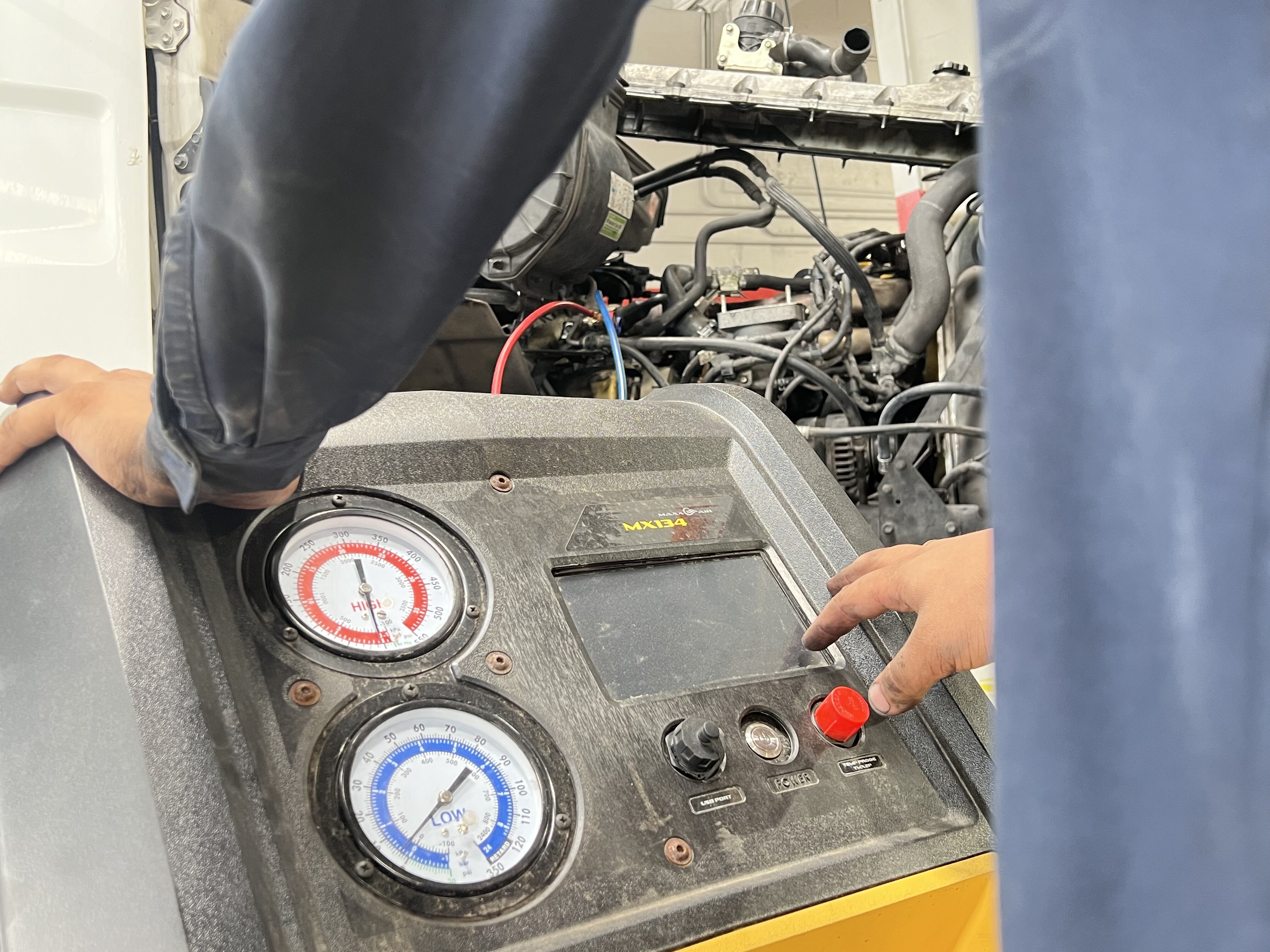 A man getting into a well-maintained commercial truck