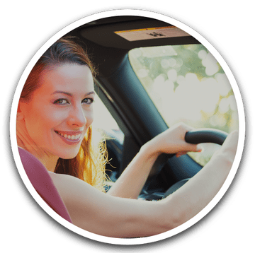 Happy Woman Driving Car